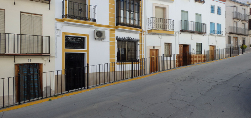 We are climbing up a village street in Luque.